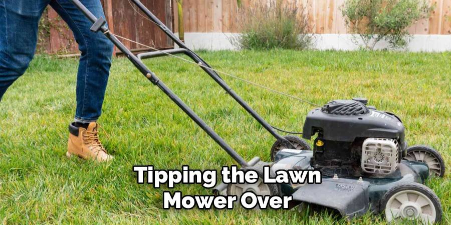 Tipping the Lawn Mower Over