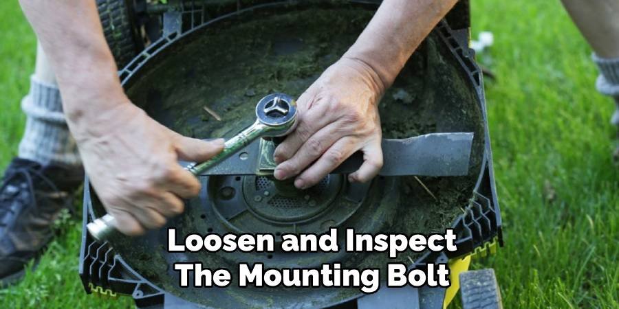 Loosen and Inspect the Mounting Bolt